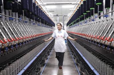 纺织业需科技“造血”——全国人大代表范冬云的行业转型思考