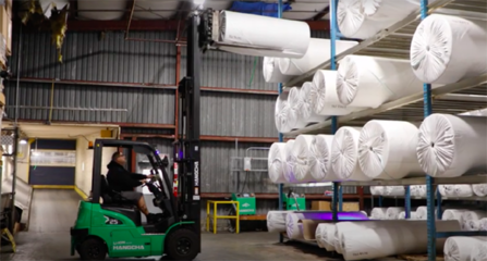 杭叉集团革命性创新锂电叉车 纺织业绿色转型的典范引擎